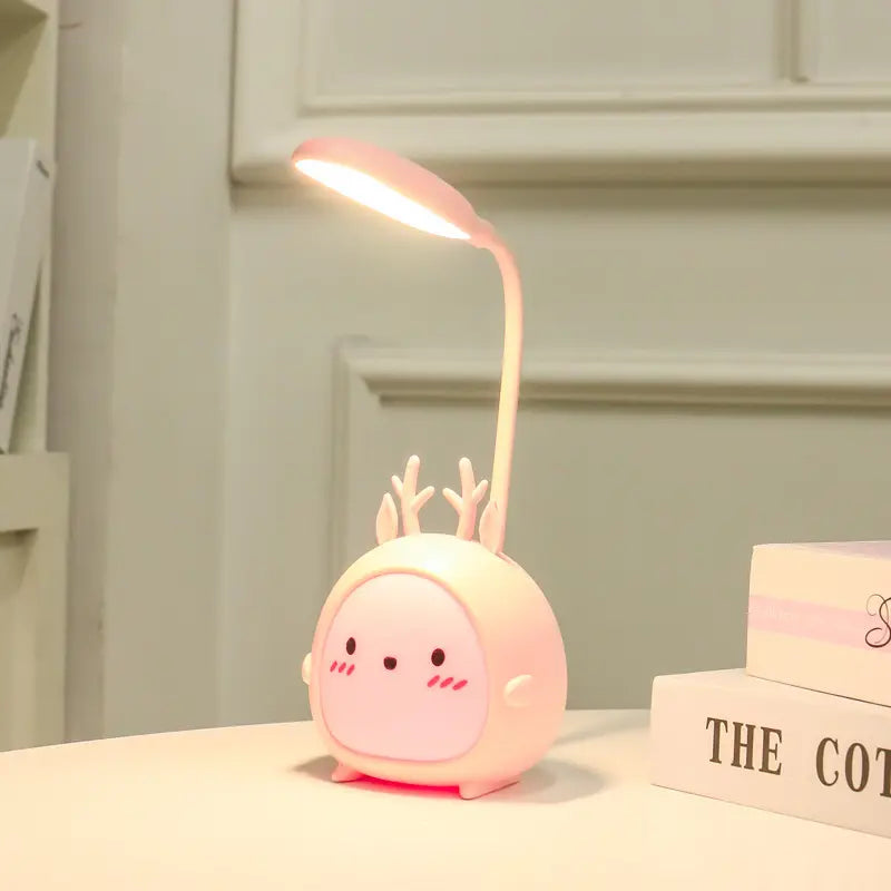 Cute USB Rechargeable LED Table Lamp for eye-friendly illumination. Ideal for dorms, bedrooms, and trendy spaces. Modern, portable, and efficient