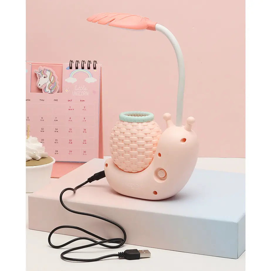 Rechargeable Colorful Dinosaur Snail Lamp with Pen Stand for Kids' Desks.